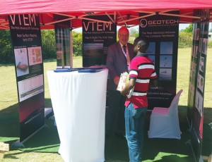 DRC Mining Week - Doug Pitcher greet an attendee at the Geotech booth